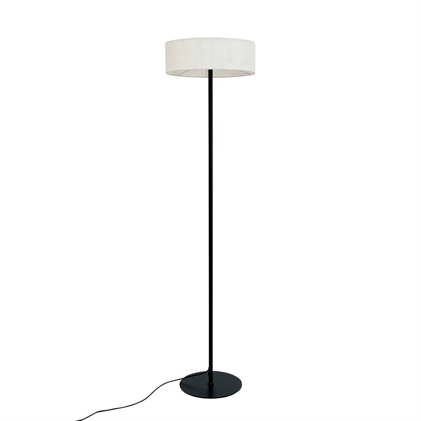 Floor lamp stands upright with a white cylindrical shade, thin black stand and round black base; a black cord runs from the base over a plain white background.