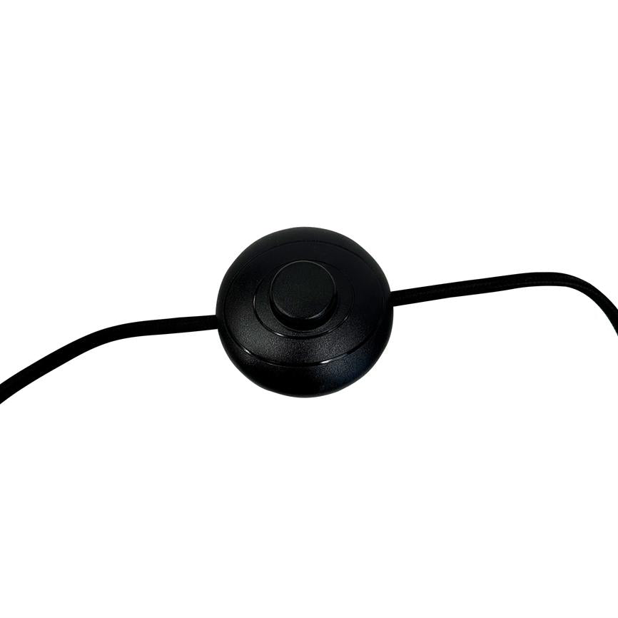 Round black inline switch located in the middle of a flat black wire; a small push button in the middle, cables running out to both sides against a uniform white background.