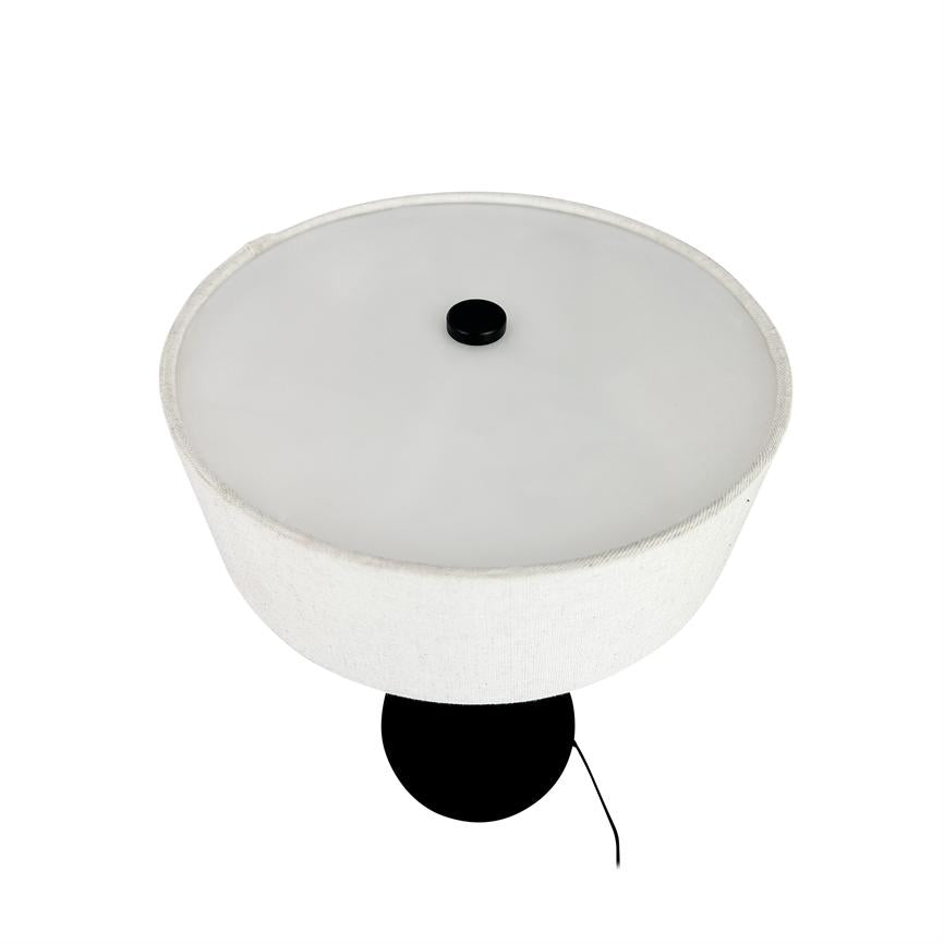 White round lampshade rests with black center knob, mounted above a black spherical base; black wire hangs down against a uniform white background.