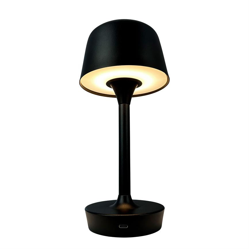 Black table lamp with round shade and slim shaft, emits soft, warm circular light under the shade; standing on a round base against white background.