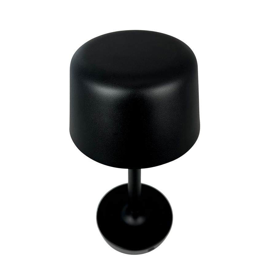 Black table lamp stands with a rounded cylindrical shade on a narrow rod and a round foot, placed on a uniform white background.