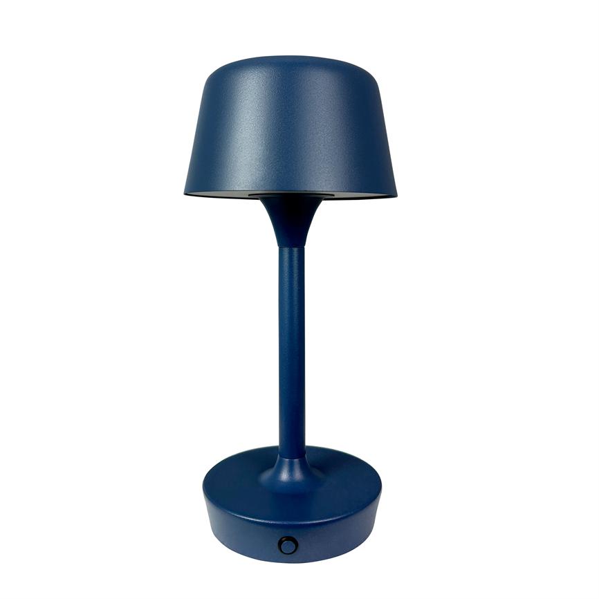 Table lamp stands upright; matt dark blue screen and slim column on a round base, switched on via a small black push button at the base, placed against a white background.