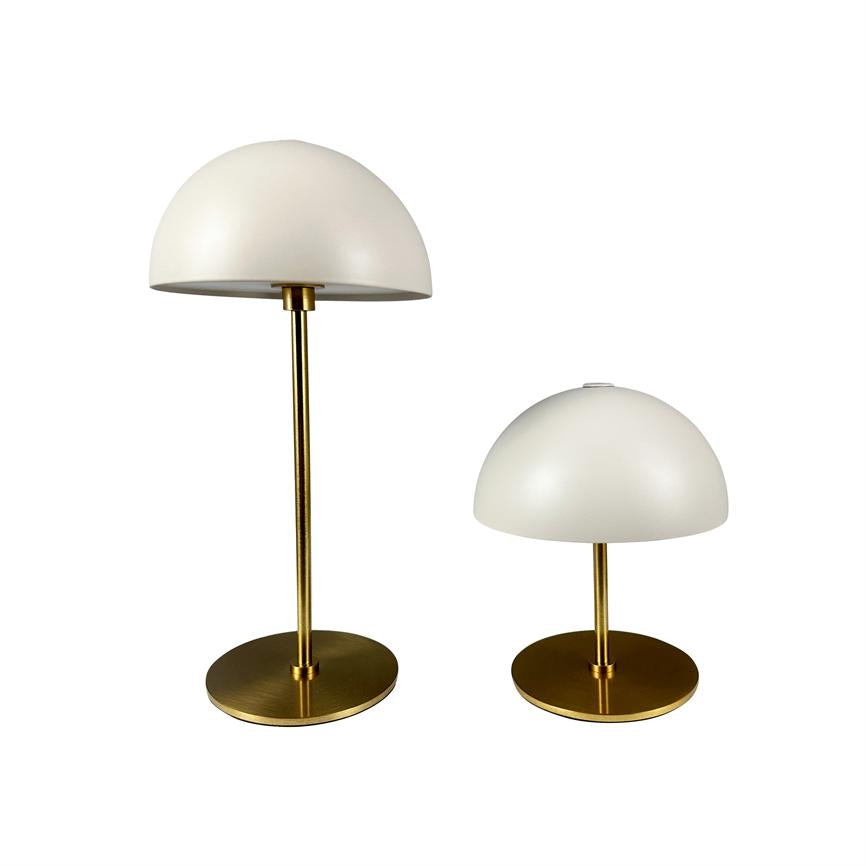 Two white, hemispherical table lamps with gold-colored brass stems and round bases stand next to each other on a white background — one higher, one lower.