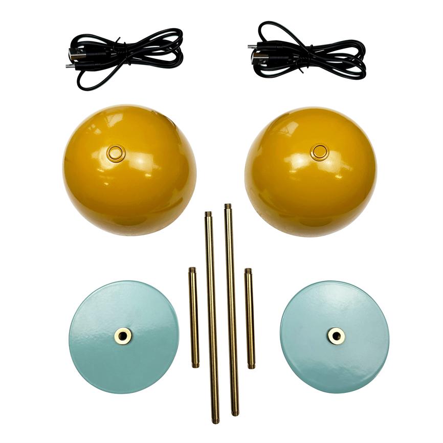 Two yellow lampshades, two blue-green ceiling bowls, four brass rods and two black power cables are arranged on a white background as a lamp set.