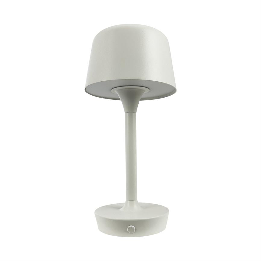 Table lamp stands upright with round shade and slim rod; base has small push button, in light grey/white matt finish, placed on uniform white background.