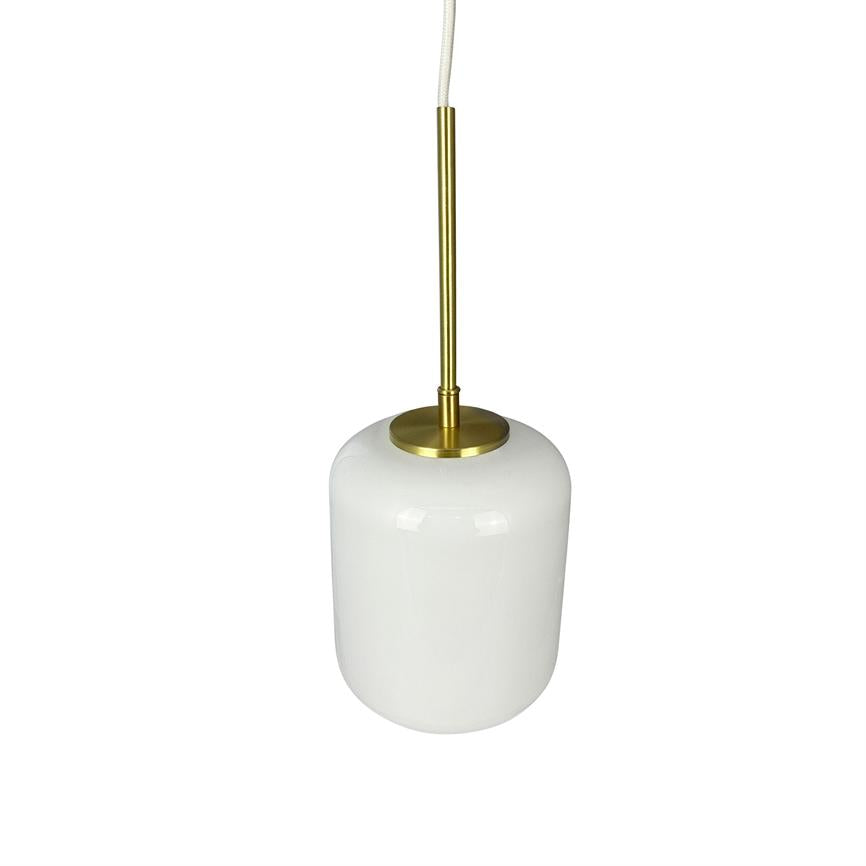 A white cylindrical glass shade (pendant) hangs from a white fabric cord and slender brass rod; opal glass diffuser against a neutral, plain white background.