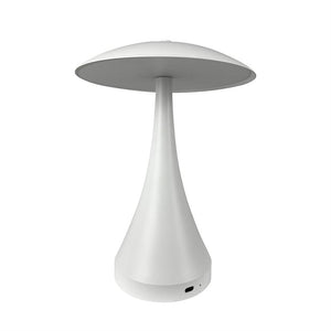 White table lamp stands upright with round shade and slim, cone-shaped base, ready to light; depicted alone against a uniform white background.