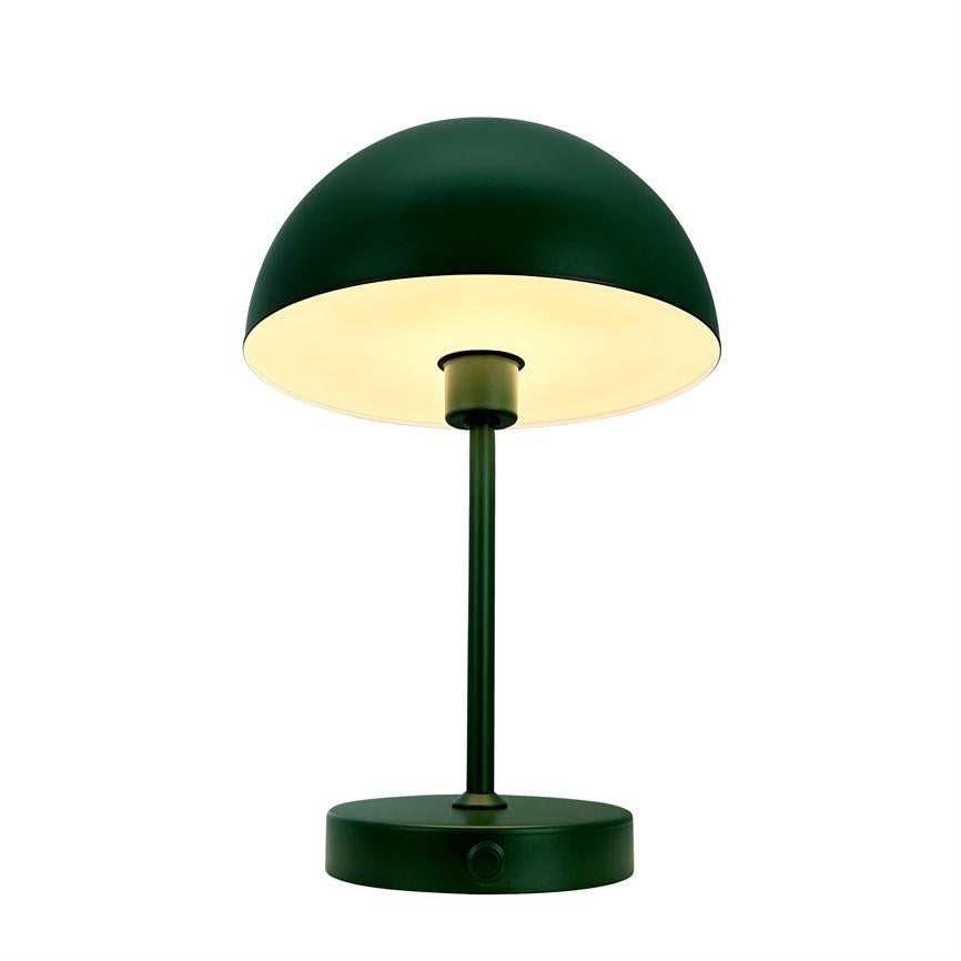Dark green table lamp, hemispherical shade glows warm downwards; slim bar connects screen and round foot with button, set against a neutral white background.