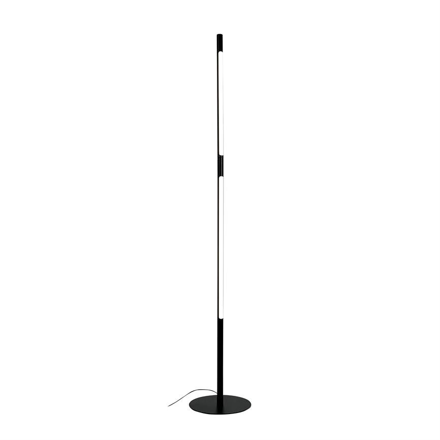 A slim, black-and-white LED floor lamp stands erect and emits soft white light; it stands on a round black base with visible cord in front of a neutral white background.