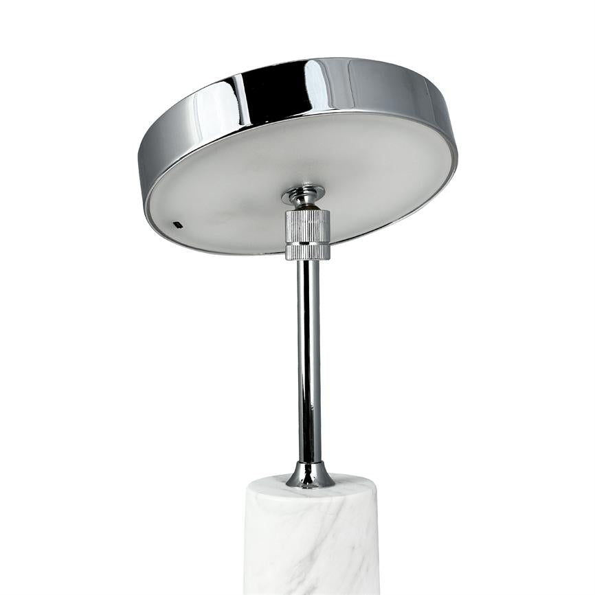 Chrome lamp head tilts on a slender rod, connected to a white marble base; clear adjustment screw, isolated against white background.