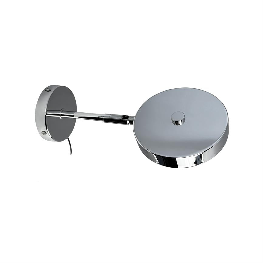 Round chrome lamp head connected to an adjustable wall arm; the lamp is angled outwards and appears against a uniform white background.
