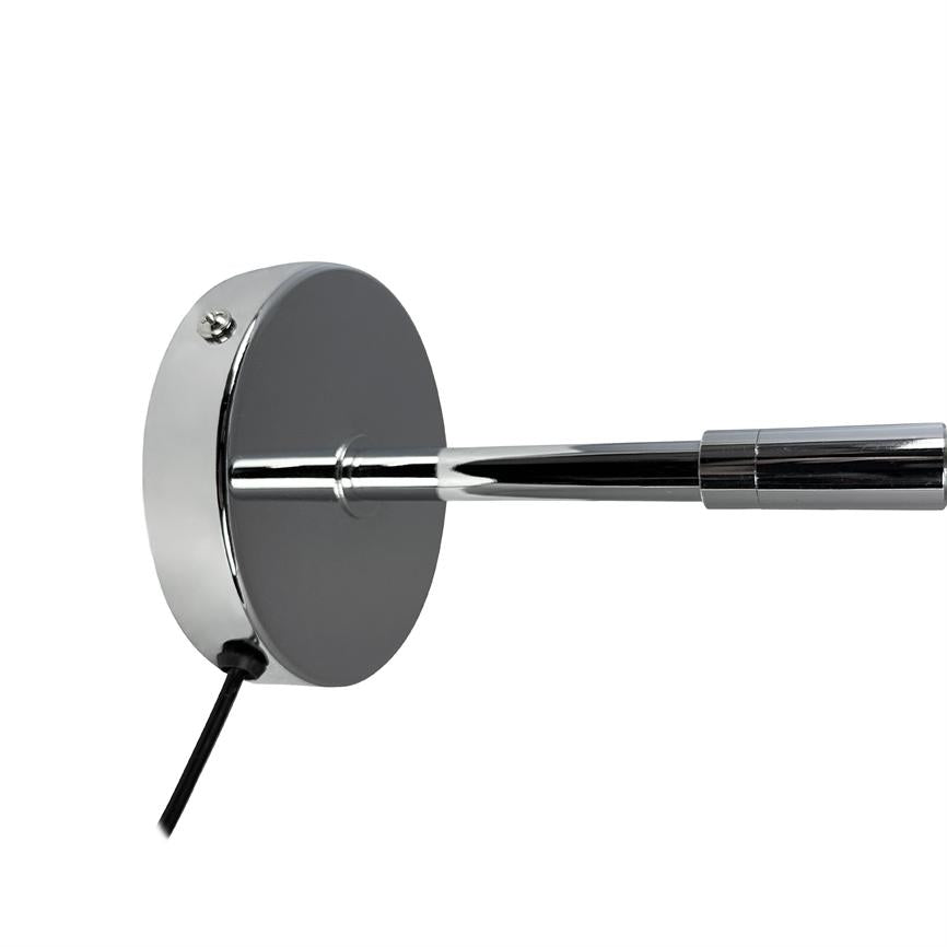 Chrome, round wall-mounted lamp base emits a bright chrome bar horizontally; a black wire runs downwards against a uniform white background.
