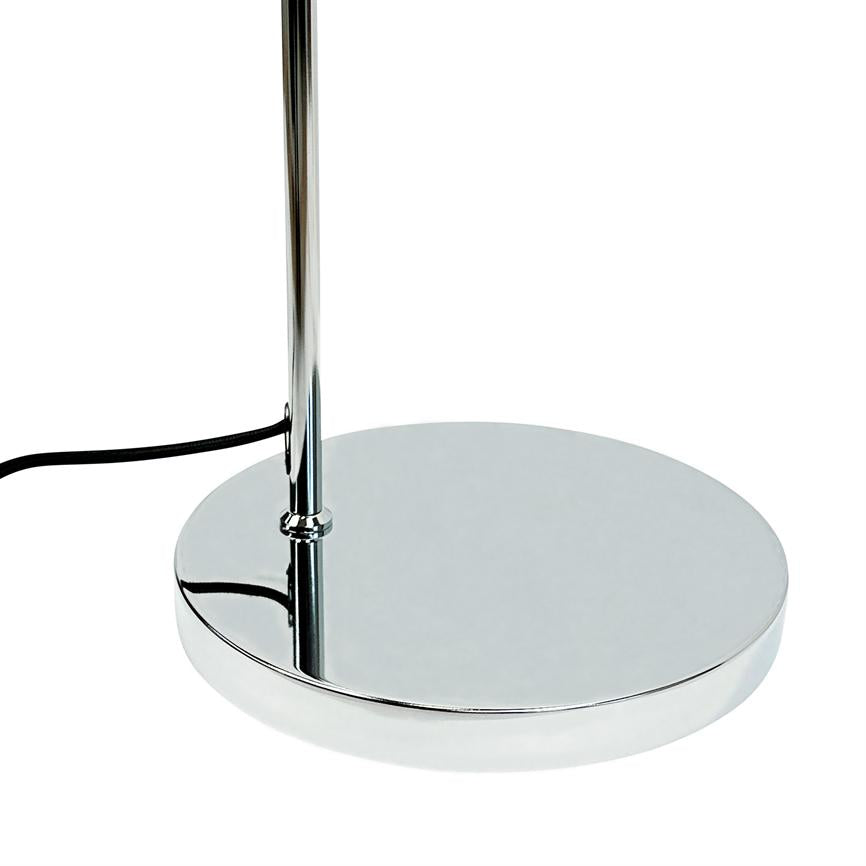 Round chrome lamp base supports a vertical rod; a black wire runs from the edge of the base on a uniform white background.