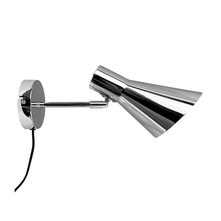 Chrome wall lamp mounted on a round wall plate, arm holding an elongated conical shade angled forward; black wire hanging down. Product isolated against white background.