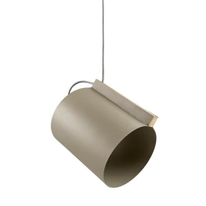 A cylindrical, beige lamp pendant hangs diagonally from a thin cord, mounted with a small light-colored wooden bracket, and floats in front of a uniform white background.