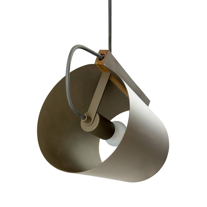 Hanging pendant-lamp with angled cylindrical metal shade, visible light source in the middle, fixed with wooden and metal suspension and cloth-covered cord; isolated against white background.