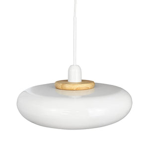 A white, disc-shaped hanging lamp hangs from a thin white cord; a small round wooden detail sits at the top — sleek, minimalist design against a neutral white background.
