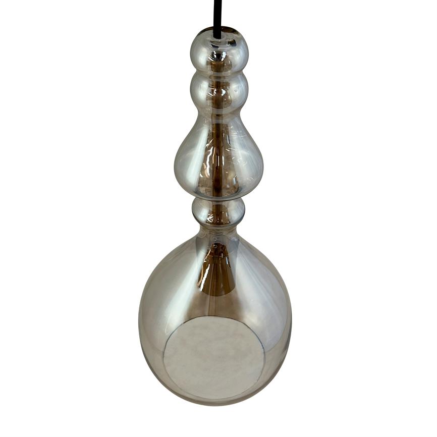 A drop-shaped, smoky glass pendant with bulbous, stacked shapes hangs from a black cord; clear inner lamp holder and reflective surface, isolated against a uniform white background.