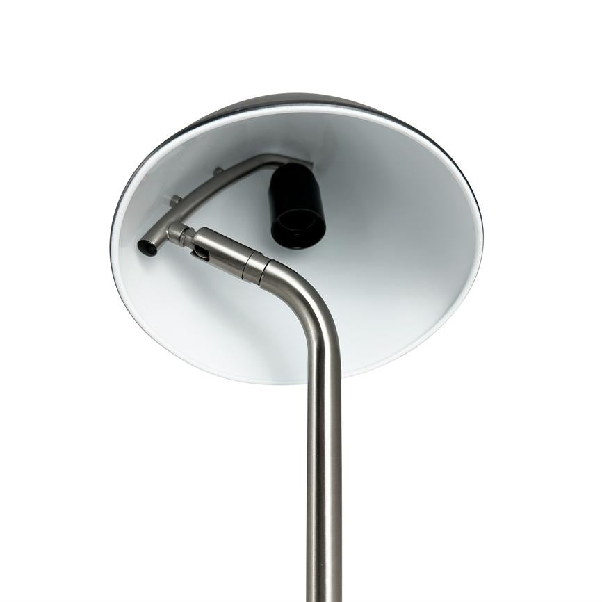 Floor lamp with curved brushed metal rod, which carries a round, white inside lampshade facing upwards with a visible black socket against a uniform white background.