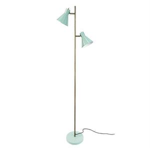 Floor lamp with two mint green, cone-shaped shades mounted on a slender brass rod, angled in different directions above a round mint green base; black wire is loose.