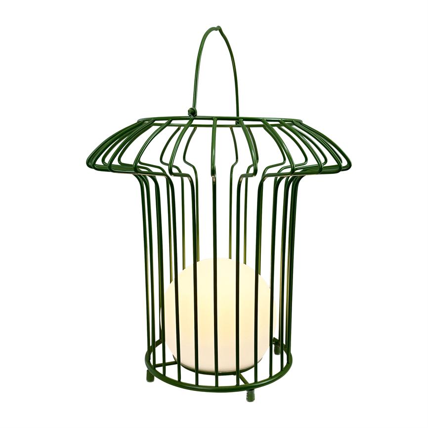 Green metal lantern encases and illuminates a warm white ball light, stands on small feet and has a curved handle against a neutral white background.