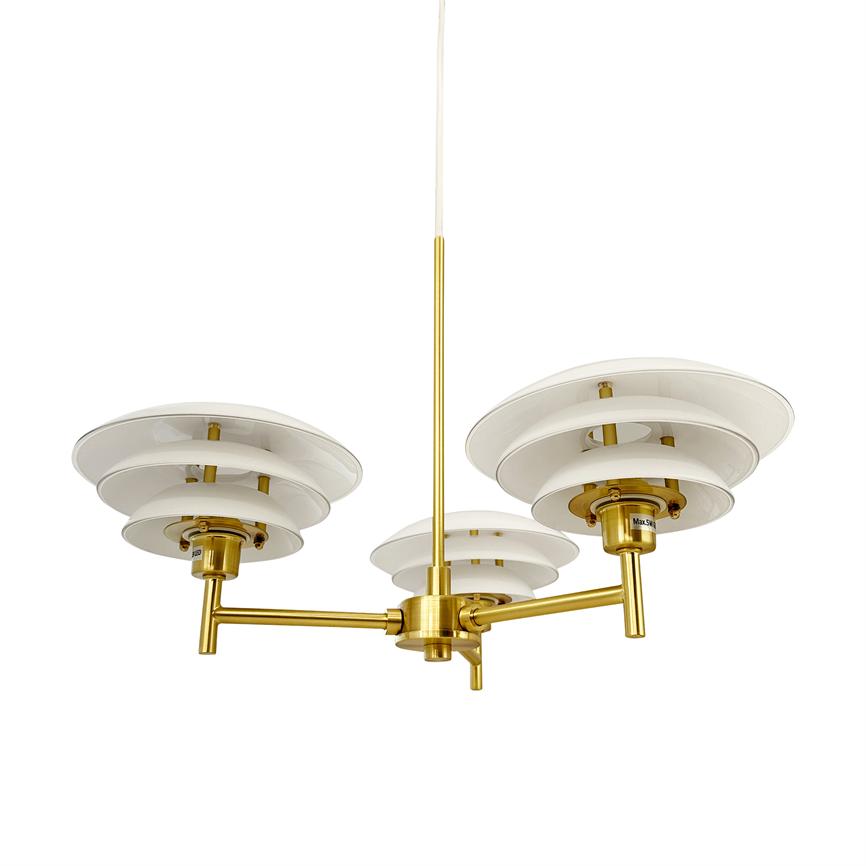 A gold-plated ceiling lamp with three white, tiered shades hangs from a central pole; the arms stretch out into a minimalist, white space.