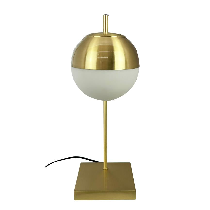Table lamp with gold-colored metal base and slim rod, has a two-color spherical shade (gold-colored upper half, matte white lower half) and stands on a white background with a black cord.
