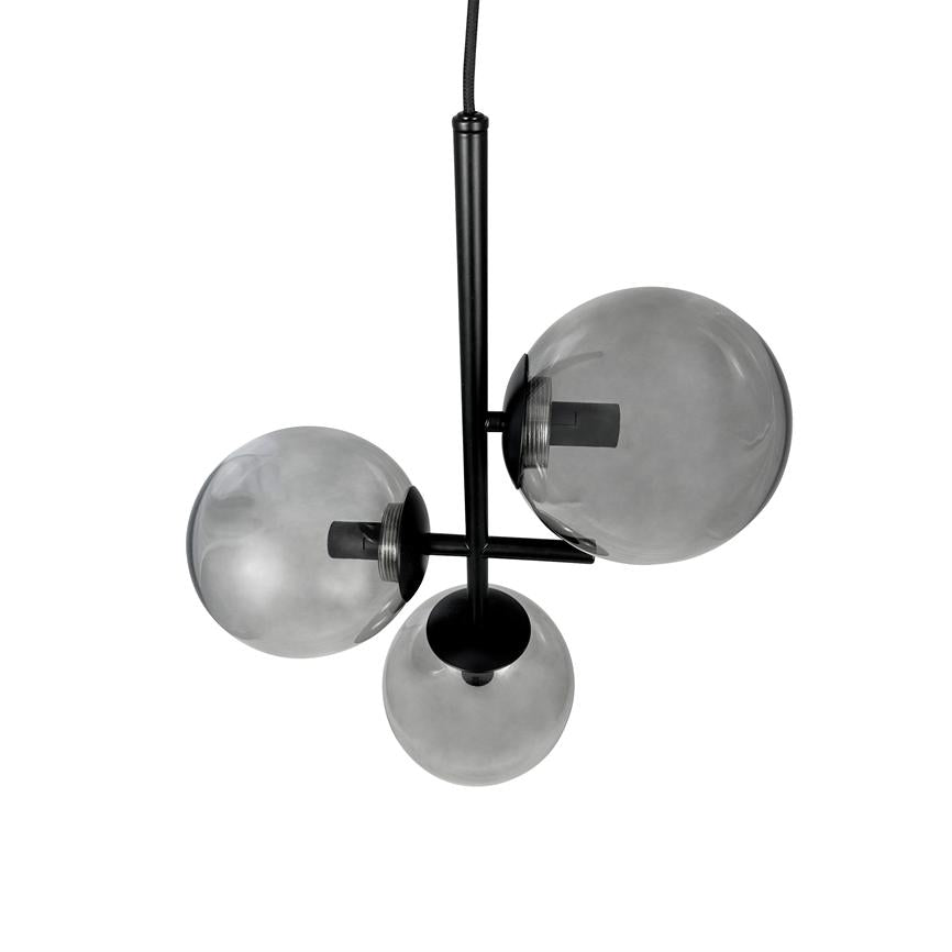 Ceiling lamp with three smoky glass domes hangs from a black metal rod above a uniform white background.