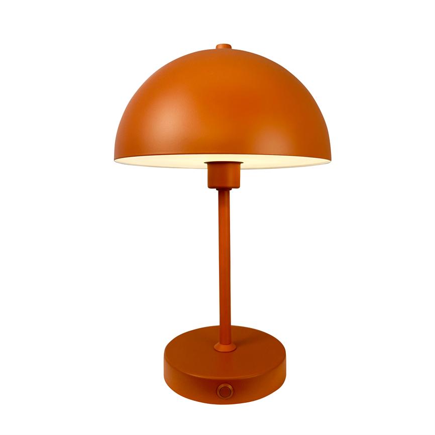 Orange metal table lamp emits soft, warm light from a hemispherical shade, standing on a slim rod and round base against a uniform white background.