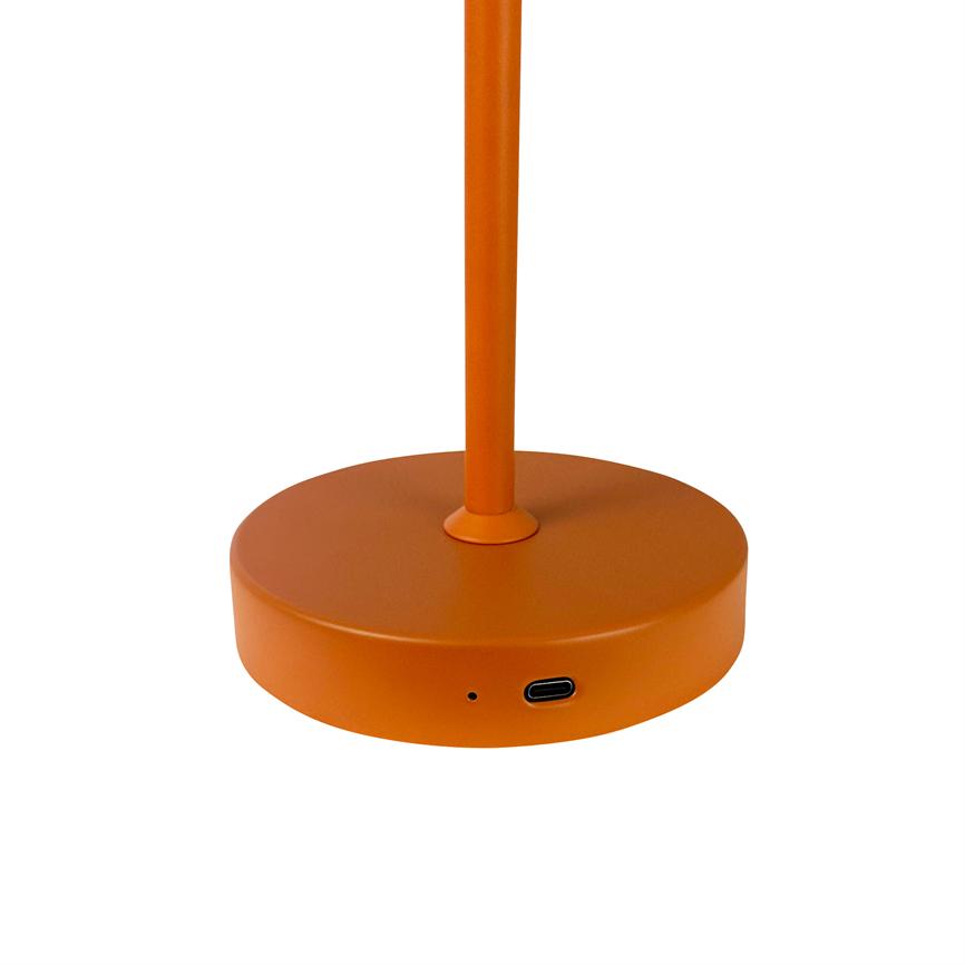 Orange lamp base stands vertically on white background; cylindrical foot shows a USB-C port and a small hole (indicator), with a thin bar rising from the center.