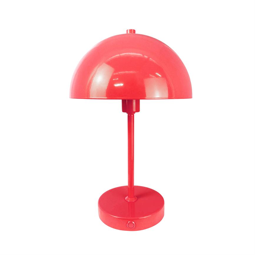 Red table lamp with hemispherical shade, slim shaft and round base stands centrally against a uniform white background.