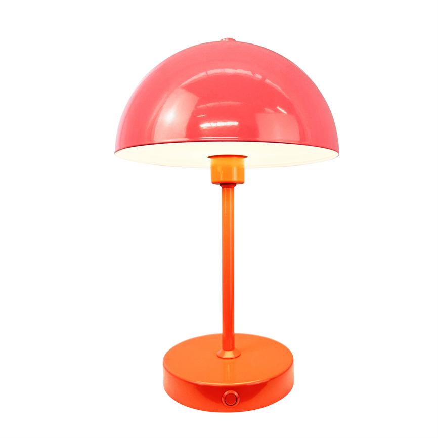 Red-orange table lamp with hemispherical shade, lights downwards; thin plinth and round foot, front on/off switch, standing on white background.