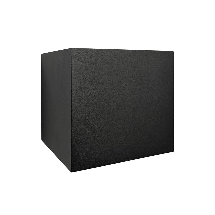 Black textured cube rests quietly on white background, shown in perspective with three visible faces and a soft shadow below.