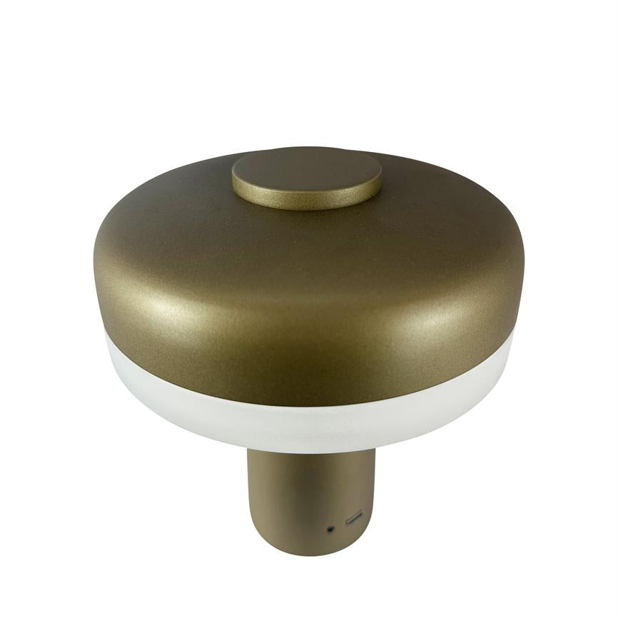 A mushroom-shaped, bronze-colored portable lamp with white diffusion ring, round top button and USB port stands centrally against a white, plain background.