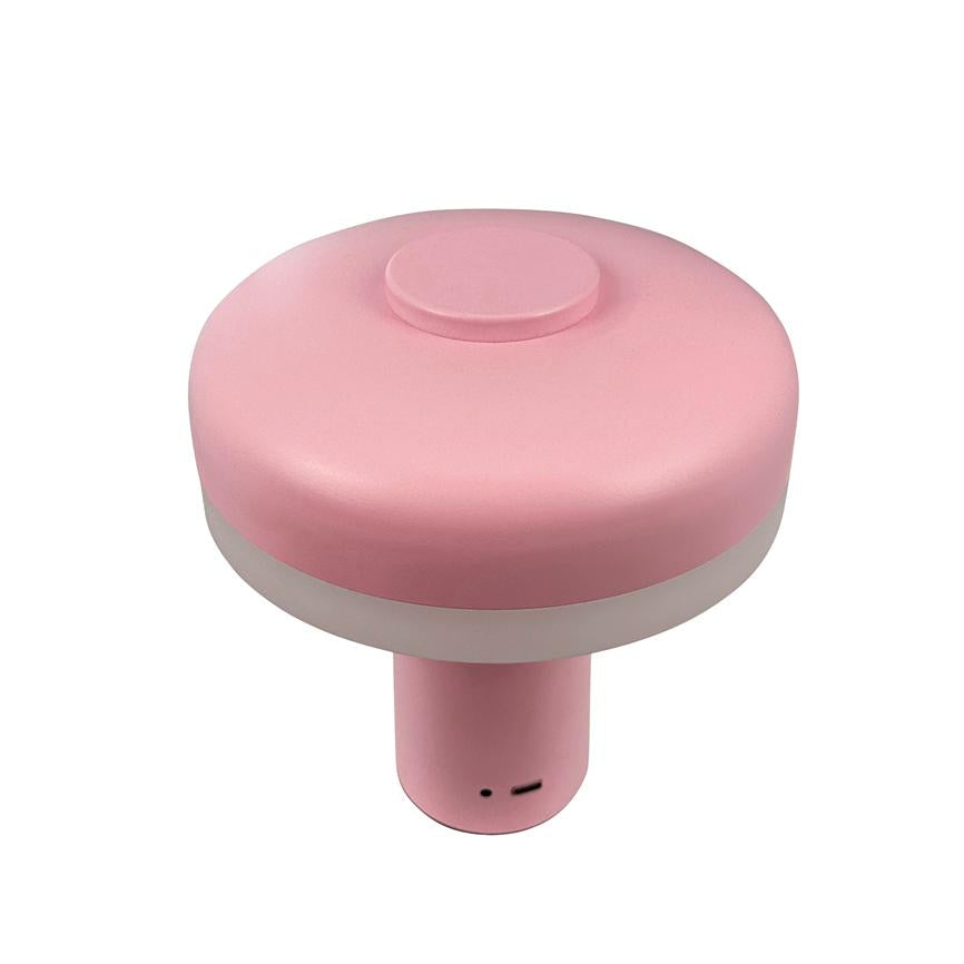 Round, pink mushroom-shaped night lamp (LED), stands upright with wide top and narrow base; white center band and visible micro-USB charging port at the bottom.