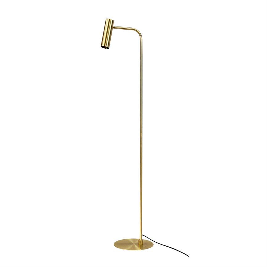 Gold-colored floor lamp stands with slim vertical rod, curved arm and cylindrical lamp head; round flat base and black cord visible against white background.