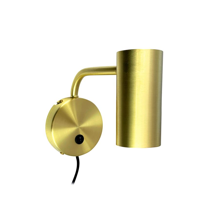 A gold colored wall lamp mounted on a round wall bracket; a curved arm leads to a vertical cylindrical screen, with a black cord and a small round power button.