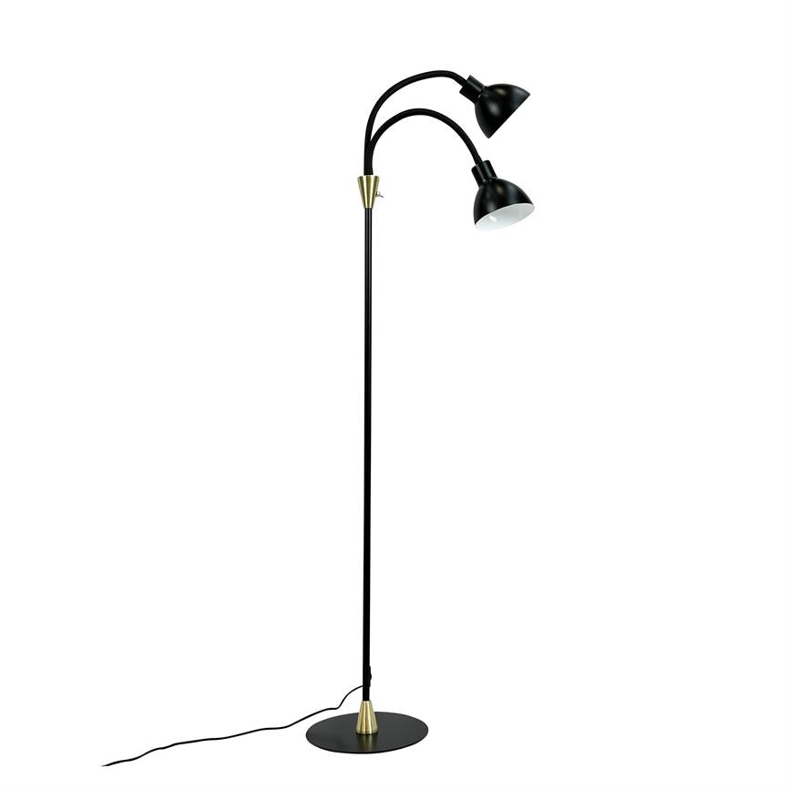 Floor lamp with two curved, adjustable arms and black shades that point downwards; has gold accents at joints, stands on round black base with visible wire on white background.