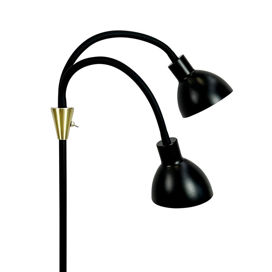 Floor lamp with two bent, flexible arms; each terminated by a black, bowl-shaped shade directed downwards. Black metal rod with gold colored conical coupling, shown on white background.