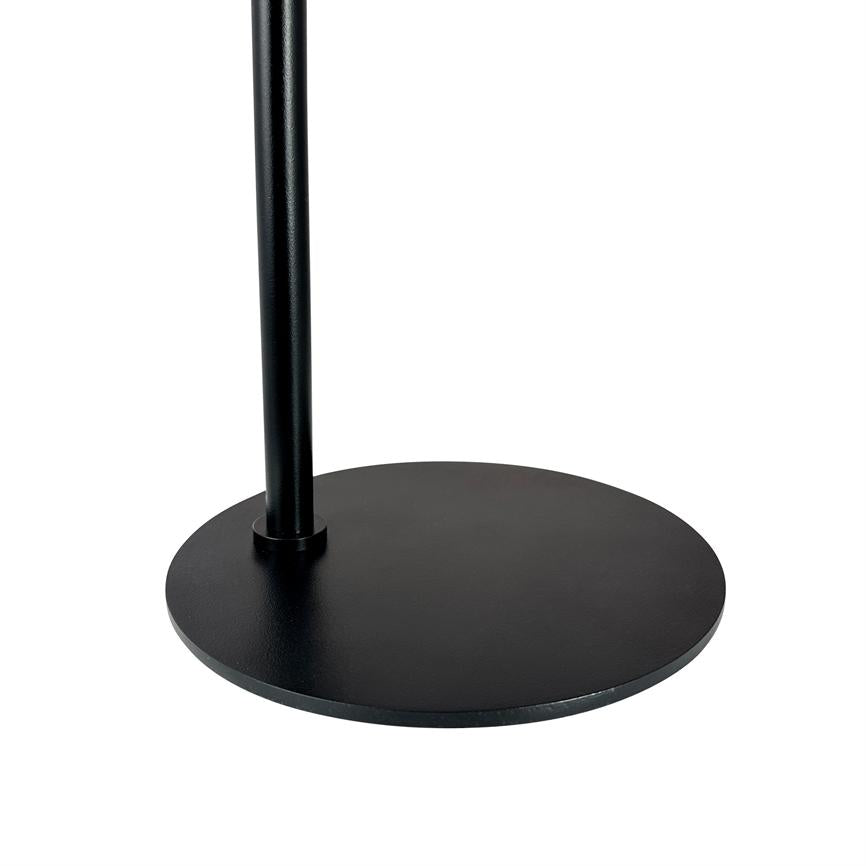 A black round metal foot supports a narrow, vertical metal rod. The surface of the foot is matte; the motif appears on a uniform white background.