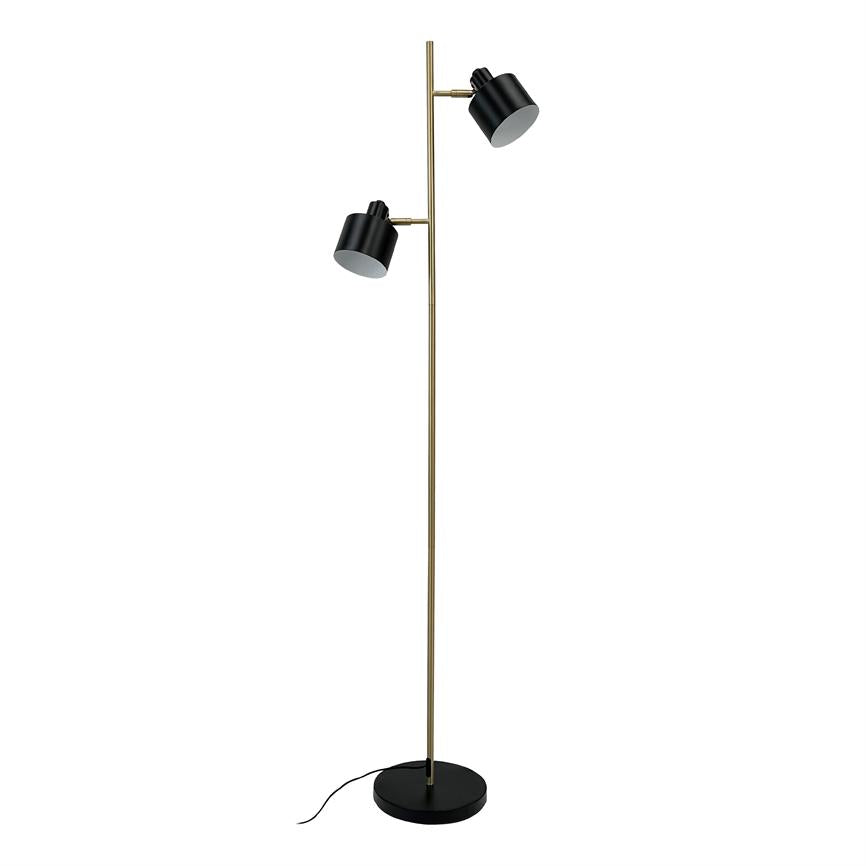 A slim floor lamp stands with two adjustable black shades pointing in different directions, mounted on a tall brass rod above a round black base on a white background.