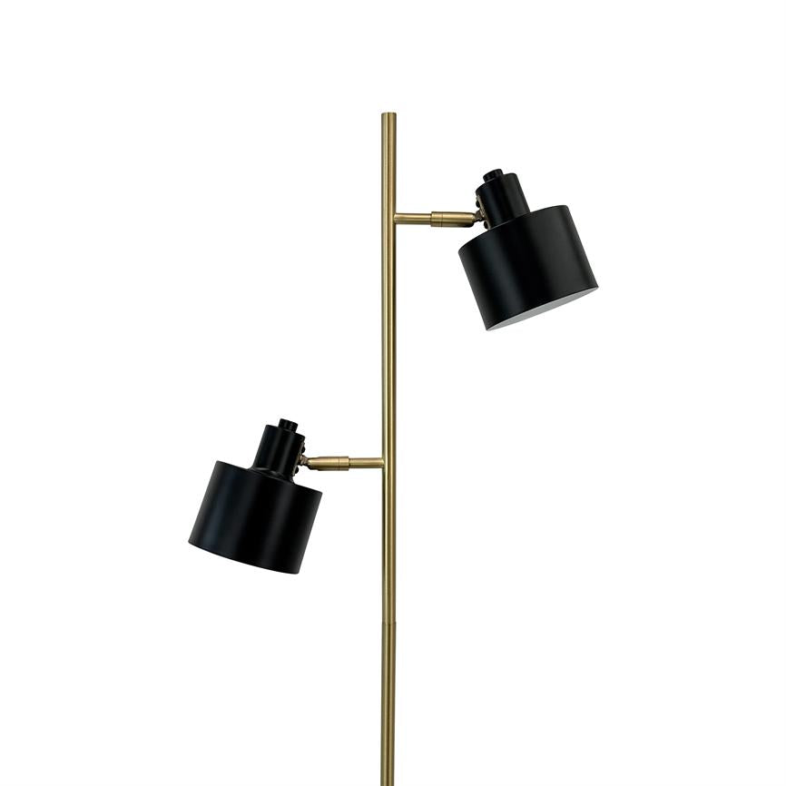 Floor lamp with two adjustable black shades mounted on a vertical brass rod; the screens point in different directions against a uniform white background.