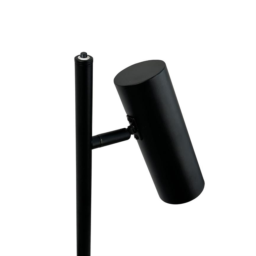 Black cylindrical lamp attached obliquely to a vertical black metal rod; hinged arm allows for adjustment. Surroundings: uniform white background with no other objects.