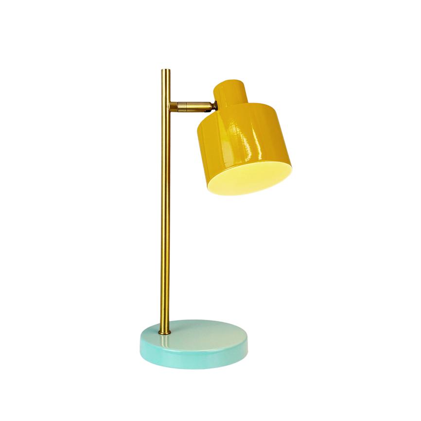 Yellow table lamp angled downwards, attached to a slender gold colored rod on round mint green base; glows warmly from the screen against a simple white background.