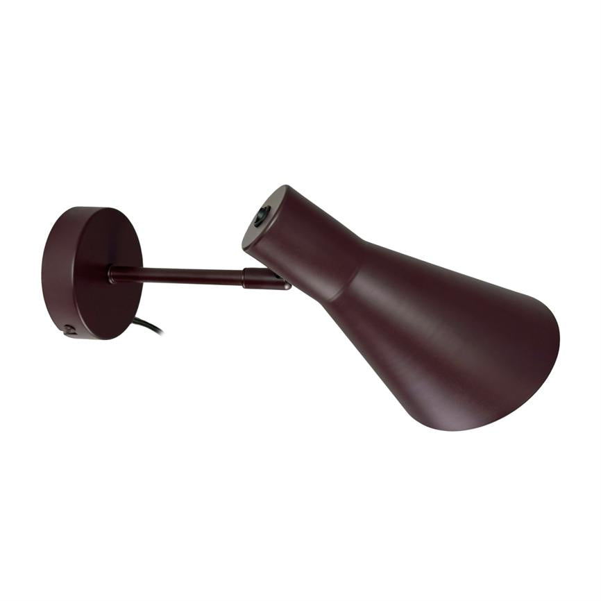 Wall lamp with adjustable arm and cone-shaped shade, stands diagonally from a round wall bracket; matte burgundy metallic finish on a neutral white background.