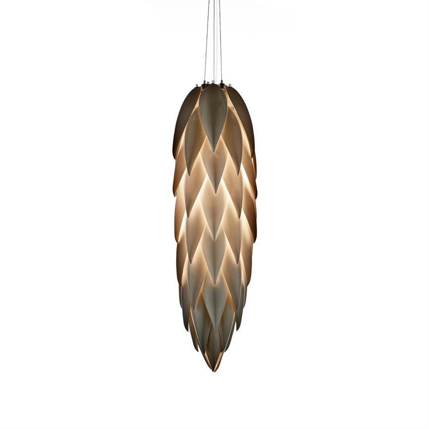 A cone-shaped pendant lamp hangs from three thin wires, emitting warm, diffused light through overlapping leaf-like shades, set against a neutral white background.