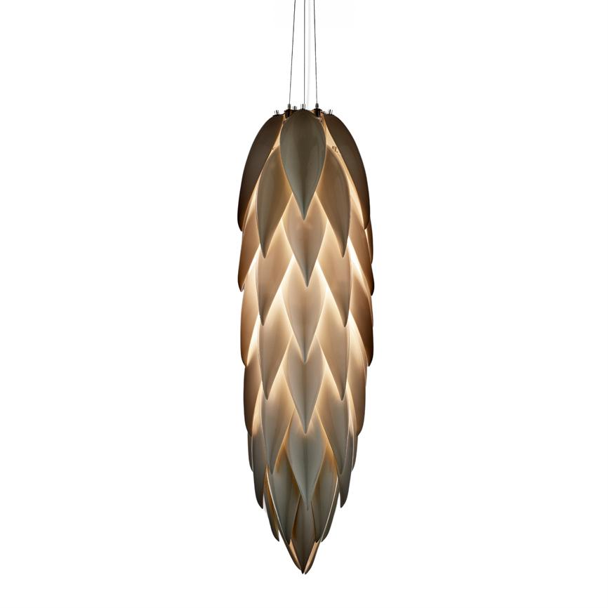 A cone-shaped, cone-like pendant lamp hangs and emits warm, diffused light through overlapping leaf-like shades; it is suspended by three thin cables against a white background.